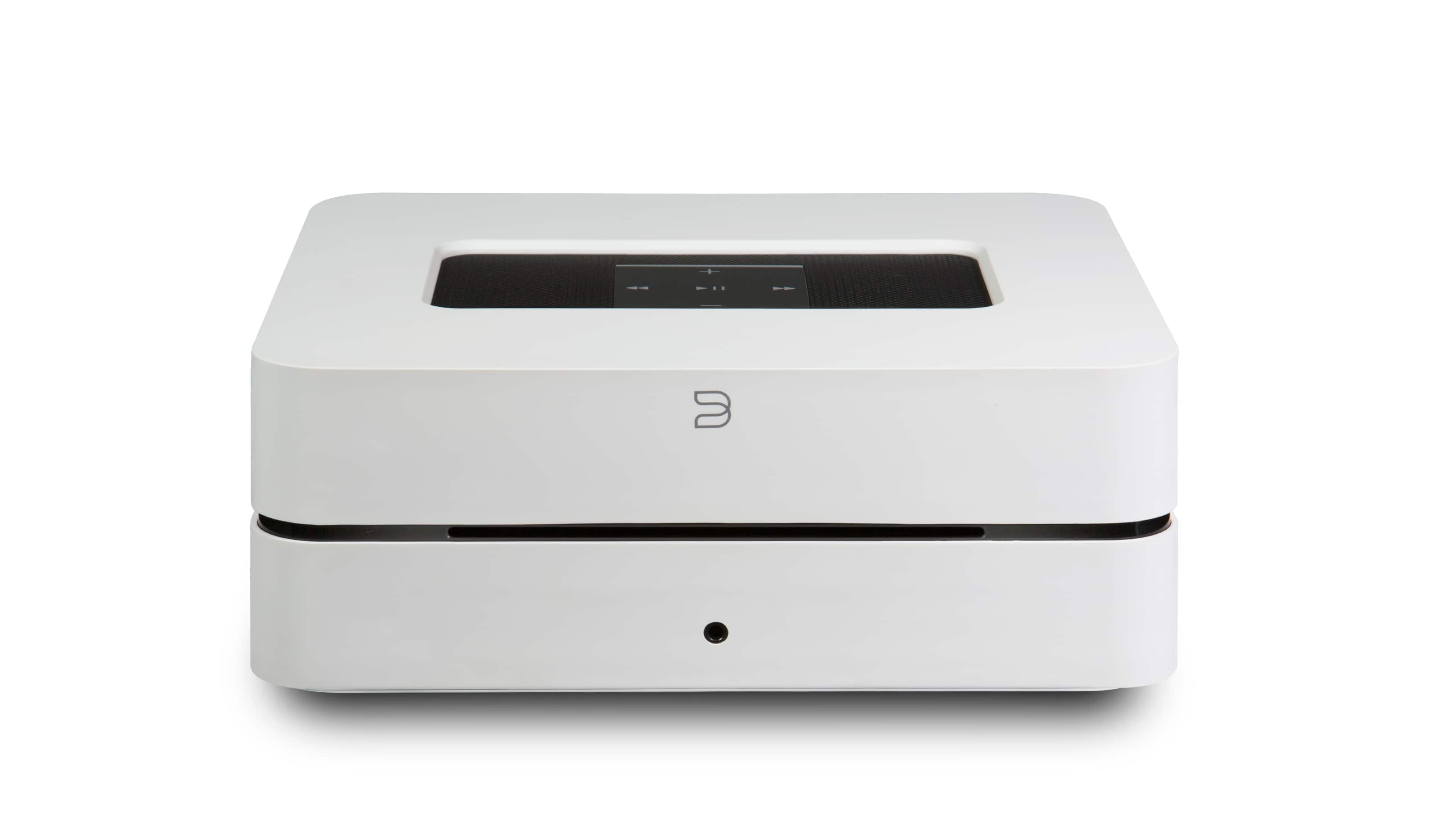Bluesound VAULT 2i 2TB media player installed in a modern living‑room AV rack